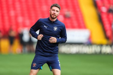 Blackpool 'dan James Husband, 21 Eylül 2024' te The Valley, Londra, İngiltere 'de oynanan Sky Bet 1 karşılaşmasından önce ısınıyor.