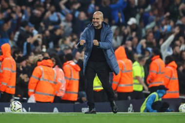 Manchester City 'nin Pep Guardiola teknik direktörü 22 Eylül 2024 tarihinde Etihad Stadyumu' nda oynanan Premier League maçında 2-2 'lik galibiyet golünü kutluyor.