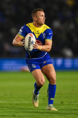 Warrington Wolves 'tan Josh Drinkwater, 27. Betfred Süper Lig Turu' nda Warrington Wolves 'a karşı London Broncos maçı sırasında 20 Eylül 2024' te Warrington, İngiltere 'deki Halliwell Jones Stadyumu' nda bir çıkış yaptı.