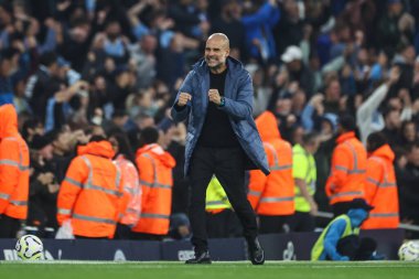 Manchester City 'nin Pep Guardiola teknik direktörü 22 Eylül 2024 tarihinde Etihad Stadyumu' nda oynanan Premier League maçında 2-2 'lik galibiyet golünü kutluyor.