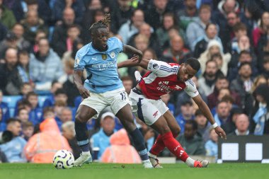 Manchester City 'den Jrmy Doku ve Arsenal' den Jurrien Timber Premier Lig maçı sırasında Manchester City ile Etihad Stadyumu 'nda 22 Eylül 2024' te karşı karşıya geldiler.