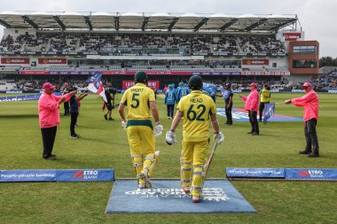 Matthew Short of Australia and Travis Head of Australia walk out during the Second Metro Bank One Day International England v Australia at Headingley Cricket Ground, Leeds, United Kingdom, 21st September 2024 clipart