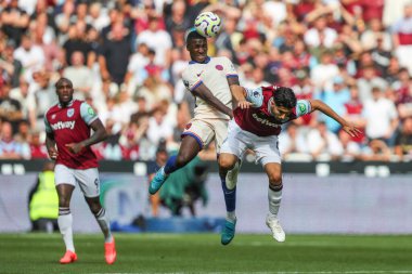 Moiss Caicedo of Chelsea fouls Carlos Soler of West Ham United during the Premier League match West Ham United vs Chelsea at London Stadium, London, United Kingdom, 21st September 2024 clipart