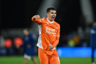 Albie Morgan of Blackpool celebrates with the fans at the end of the Sky Bet League 1 match Huddersfield Town vs Blackpool at John Smith's Stadium, Huddersfield, United Kingdom, 24th September 2024 clipart