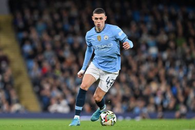 Manchester City 'den Jrmy Doku, 24 Eylül 202' de Etihad Stadyumu 'nda oynanan Carabao Kupası maçında Manchester City ile Watford arasındaki maçı 1-0 kazanma golünü kutluyor.
