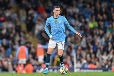 Manchester City 'den Phil Foden, 24 Eylül 2024 tarihinde Etihad Stadyumu' nda oynanan Carabao Kupası karşılaşmasında Manchester City ile Watford karşı karşıya.