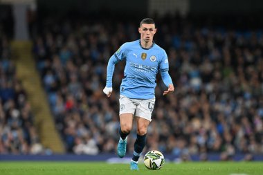 Manchester City 'den Phil Foden, 24 Eylül 2024 tarihinde Etihad Stadyumu' nda oynanan Carabao Kupası karşılaşmasında Manchester City ile Watford karşı karşıya.