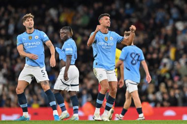 Manchester City 'den Matheus Nunes, 24 Eylül 2024' te Etihad Stadyumu 'nda oynanan Carabao Kupası maçında Manchester City ile Watford arasındaki maçı 2-0 kazanma hedefini kutluyor.