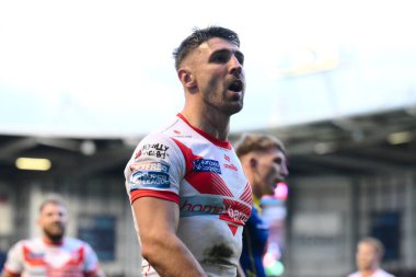 St. Helens takımının üçüncü denemesini kutlayan Tommy Makinson, 28 Eylül 2024 'te İngiltere' nin Warrington kentinde Halliwell Jones Stadyumu 'nda oynanan Betfred Süper Lig eleme turu 2 Warrington Wolves-St Helens maçında üçüncü denemesini kutluyor.