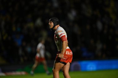 St. Helens 'ten Jonny Lomax, İngiltere' nin Warrington şehrinde düzenlenen Halliwell Jones Stadyumu 'nda oynanan Betfred Süper Lig eleme maçında skoru yükselten dönüşüm girişimini kutluyor.