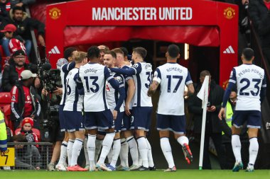 Tottenham Hotspur 'dan Brennan Johnson, Manchester United ile Tottenham Hotspur arasındaki Premier League maçında 29 Eylül 2024 tarihinde Old Trafford, Manchester, İngiltere' de 0-1 kazanma hedefini kutluyor.