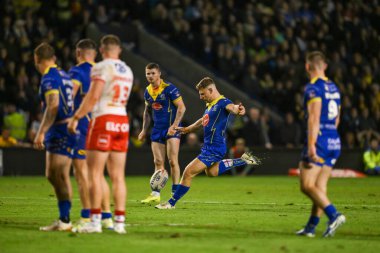 Warrington Wolves 'tan George Williams, 28 Eylül 2024' te İngiltere 'nin Warrington şehrinde oynanan Halliwell Jones Stadyumu' nda oynanan Betfred Süper Lig eleme maçında 2 Warrington Wolves-St Helens maçını kazanmak için ekstra bir gol attı.