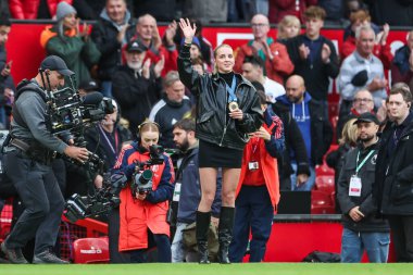 Keely Hodgkinson Olympic gold medalist at the Paris Olympics waves to the fans ahead of the Premier League match Manchester United vs Tottenham Hotspur at Old Trafford, Manchester, United Kingdom, 29th September 202 clipart