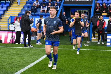Warrington Wolves takımından George Williams, 28 Eylül 2024 'te İngiltere' nin Warrington kentinde oynanan Halliwell Jones Stadyumu 'nda oynanan Betfred Süper Lig eleme maçında ısınma turuna hazırlanıyor.