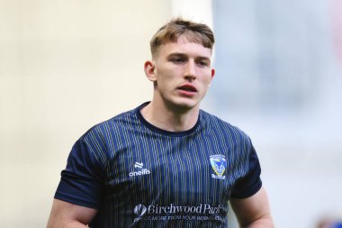Warrington Wolves 'tan Leon Hayes, 28 Eylül 2024' te İngiltere 'nin Warrington şehrinde oynanan Halliwell Jones Stadyumu' nda oynanan Betfred Süper Lig eleme maçından önce ısınıyor.