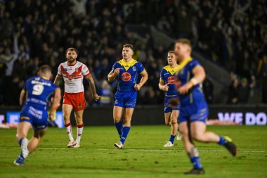Warrington Wolves 'tan George Williams, 28 Eylül 2024' te İngiltere 'nin Warrington şehrinde oynanan Halliwell Jones Stadyumu' nda oynanan Betfred Süper Lig play-off eleme maçı 2 Warrington Wolves-St Helens maçını kazanmak için attığı golü kutluyor.