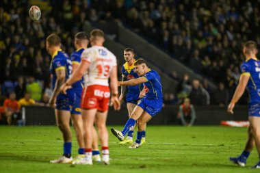 Warrington Wolves 'tan George Williams, 28 Eylül 2024' te İngiltere 'nin Warrington şehrinde oynanan Halliwell Jones Stadyumu' nda oynanan Betfred Süper Lig eleme maçında 2 Warrington Wolves-St Helens maçını kazanmak için ekstra bir gol attı.