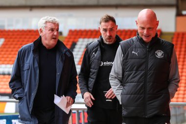 Steve Bruce head coach of Blackpool arrives with his coaching staff ahead of the Sky Bet League 1 match Blackpool vs Lincoln City at Bloomfield Road, Blackpool, United Kingdom, 1st October 2024 clipart