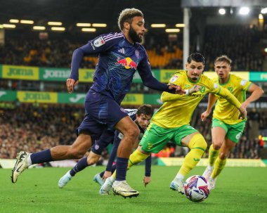 Jayden Bogle of Leeds United is put under pressure by Borja Sainz of Norwich City during the Sky Bet Championship match Norwich City vs Leeds United at Carrow Road, Norwich, United Kingdom, 1st October 2024 clipart