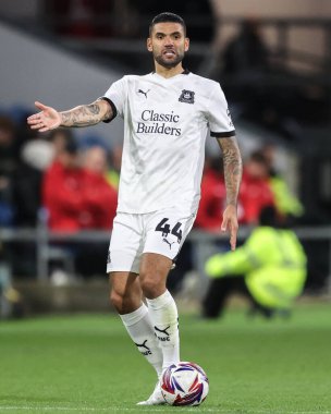 Plymouth Argyle 'dan Victor Plsson, 1 Ekim 2024' te Burnley 'nin Turf Moor, Burnley' de Plymouth Argyle 'a karşı oynadığı Gökyüzü İddia Şampiyonası maçında tepki gösterdi.