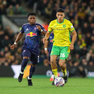 Marcelino Nunez of Norwich City is put under pressure by Junior Firpo of Leeds United during the Sky Bet Championship match Norwich City vs Leeds United at Carrow Road, Norwich, United Kingdom, 1st October 2024 clipart