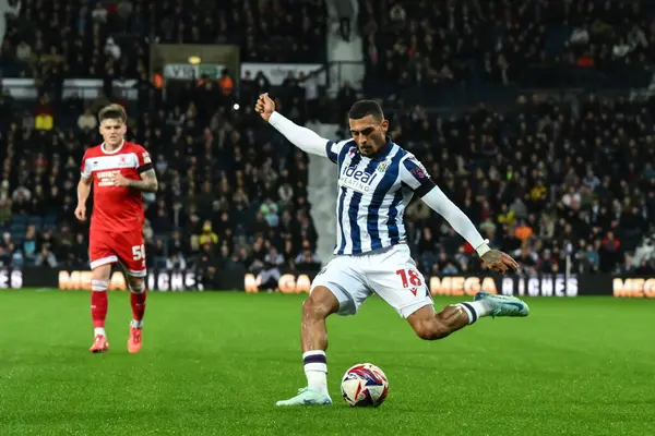 stock image Karlan Grant of West Bromwich Albion crosses the ball during the Sky Bet Championship match West Bromwich Albion vs Middlesbrough at The Hawthorns, West Bromwich, United Kingdom, 1st October 2024