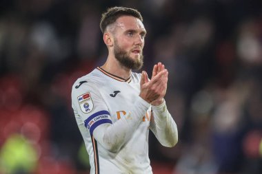 Matt Grimes of Swansea City applauds the travelling fans after the game during the Sky Bet Championship match Sheffield United vs Swansea City at Bramall Lane, Sheffield, United Kingdom, 2nd October 2024 clipart