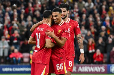 Mohamed Salah of Liverpool celebrates his goal with Trent Alexander-Arnold during the UEFA Champions League  - League Stage match Liverpool vs Bologna at Anfield, Liverpool, United Kingdom, 2nd October 2024 clipart