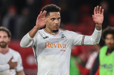 Swansea City 'den Myles Peart-Harris, 2 Ekim 2024' te Bramall Lane, Sheffield, İngiltere 'de oynanan Sheffield United ve Swansea City maçında seyircilere el sallıyor.