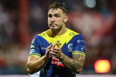 Sam Powell of Warrington Wolves applauds the traveling fans during the Betfred Super League Semi-Finals match Hull KR vs Warrington Wolves at Sewell Group Craven Park, Kingston upon Hull, United Kingdom, 4th October 2024 clipart