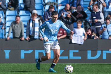 Manchester City 'den Phil Foden Premier League maçında ısınma turunda Manchester City Fulham' a karşı Etihad Stadyumu, Manchester, Birleşik Krallık, 5 Ekim 2024