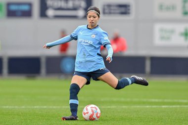 Manchester City Women 'dan Yui Hasegawa, 6 Ekim 2024' te Manchester City Women vs West Ham United Women maçında Joie Stadyumu 'nda pas attı.