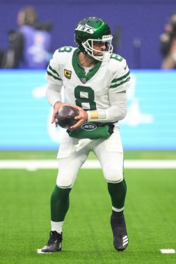 Aaron Rodgers of the New York Jets in action during a drive in the Week 5 match New York Jets vs Minnesota Vikings at Tottenham Hotspur Stadium, London, United Kingdom, 6th October 2024 clipart