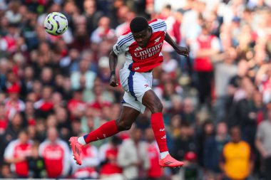 Arsenal 'li Thomas, 5 Ekim 2024' te Birleşik Krallık 'taki Emirates Stadyumu' nda oynanan Premier League maçında topu sürüyor.