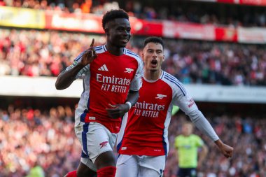Arsenal 'den Bukayo Saka, 5 Ekim 2024' te Emirates Stadyumu 'nda oynanan Premier League maçında 3-1' lik galibiyet golünü kutluyor.