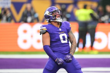 Minnesota Vikings 'ten Ivan Pace Jr. New York Jets - Minnesota Vikings maçında 6 Ekim 2024' te Tottenham Hotspur Stadyumu 'nda Aaron Rodgers - New York Jets - Minnesota Vikings maçında çuvallamasını kutluyor.