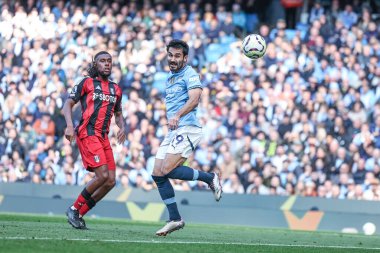 Manchester City 'den Kay Gndoan Premier League maçında Manchester City' ye karşı Fulham maçında 5 Ekim 2024 'te Etihad Stadyumu' nda kaleye doğru ilerliyor.