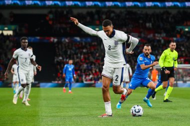 İngiltere 'den Trent Alexander-Arnold, UEFA Uluslar Ligi - B-Grubu B2 - İngiltere' nin Yunanistan 'a karşı Wembley Stadyumu, Londra, İngiltere' de 10 Ekim 2024 'te oynadığı maçta arka topuk pasına çıktı.