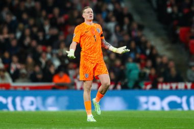 İngiltere 'den Jordan Pickford, UEFA Uluslar Ligi - B-Grubu B2 - 10 Ekim 2024' te Wembley Stadyumu 'nda İngiltere' ye karşı Yunanistan maçında tepki gösterdi.