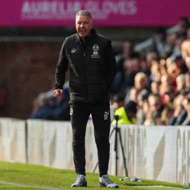 Darren Ferguson Manager of Peterborough United Shouts instructions to his players during the Sky Bet League 1 match Peterborough United vs Rotherham United at Weston Homes Stadium, Peterborough, United Kingdom, 12th October 2024 clipart