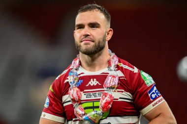 Wigan Warriors 'dan Kaide Ellis, 12 Ekim 2024' te Old Trafford, Manchester, İngiltere 'de oynanan Betfred Süper Lig Süper Lig Grand League karşılaşmasının ardından takım zaferinin ardından gülümsüyor.