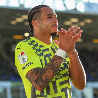 Sam Nombe applauds Rotherham fans as he walks back to the dug out after being subbed during the Sky Bet League 1 match Peterborough United vs Rotherham United at Weston Homes Stadium, Peterborough, United Kingdom, 12th October 2024 clipart