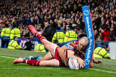 Wigan Warriors 'dan Liam Marshall, 12 Ekim 2024' te Old Trafford, Manchester, Birleşik Krallık 'ta oynanan Betfred Süper Lig Grand League karşılaşmasında ofsayt olarak hükmedilen bir deneme için sahaya çıkıyor.