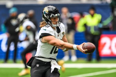 Trevor Lawrence of the Jacksonville Jaguars during pre game warm ups ahead of the Week 6 match Chicago Bears vs Jacksonville Jaguars at Tottenham Hotspur Stadium, London, United Kingdom, 13th October 2024 clipart