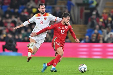 Galler 'den Liam Cullen, UEFA Uluslar Ligi - Grup B - Grup 4 maçında Karadağlı Marko Jankovi' yi Cardiff City Stadyumu, İngiltere 'nin Cardiff kentinde 14 Ekim 2024' te Galler-Karadağ maçında oyaladı.