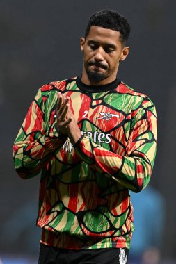 William Saliba of Arsenal applauds fans as he warms up ahead of the Carabao Cup Last 16 match Preston North End vs Arsenal at Deepdale, Preston, United Kingdom, 30th October 2024 clipart