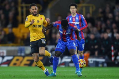 Kristal Saray 'dan Marc Guhi, Wolverhampton Wanderers maçında Wolverhampton Wanderers ile Molineux, Wolverhampton, Birleşik Krallık' ta 2 Kasım 2024 'te oynanan karşılaşmada Wolverhampton Wanderers takımından Matheus Cunha' yı yendi.