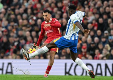 Trent Alexander-Arnold of Liverpool shot towards goal is blocked by Danny Welbeck of Brighton & Hove Albion during the Premier League match Liverpool vs Brighton and Hove Albion at Anfield, Liverpool, United Kingdom, 2nd November 2024 clipart