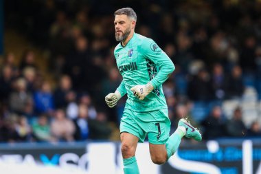 Gillingham 'dan Glenn Morris, 2 Kasım 2024 tarihinde İngiltere' nin Gillingham şehrinde oynanan MEMS Priestfield Stadyumu 'nda oynanan Gillingham-Blackpool Birinci Raund karşılaşmasında sahada.