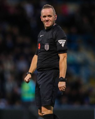 Referee Carl Brook looks on during the Emirates FA Cup First Round match Gillingham vs Blackpool at MEMS Priestfield Stadium, Gillingham, United Kingdom, 2nd November 2024 clipart